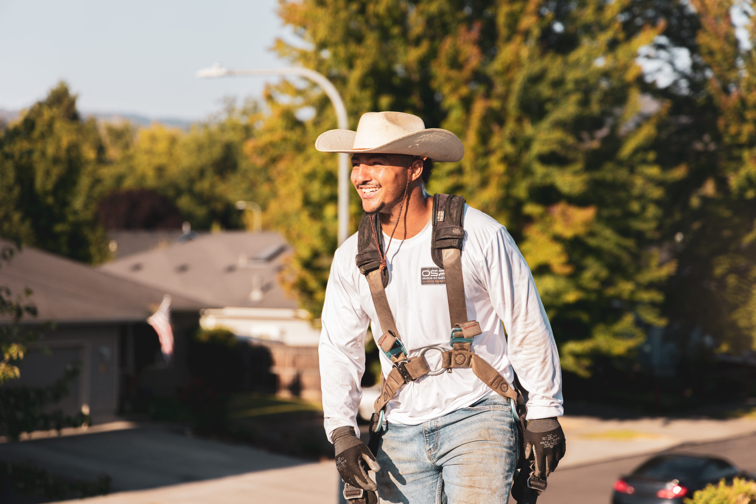 Obsidian Sky Roofing roofer smiling on a Southern Oregon jobsite